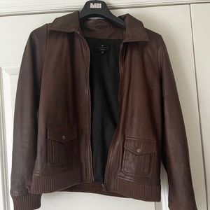 Brand is Essentiel. Size 12 for boys. Leather Jacket. Colour brown.